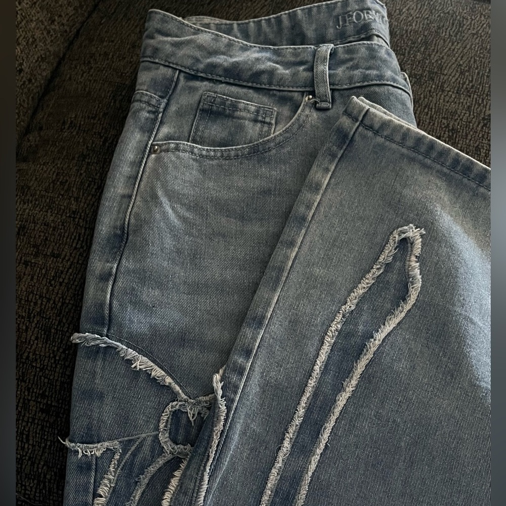 Light blue, Bow jeans, wide leg.